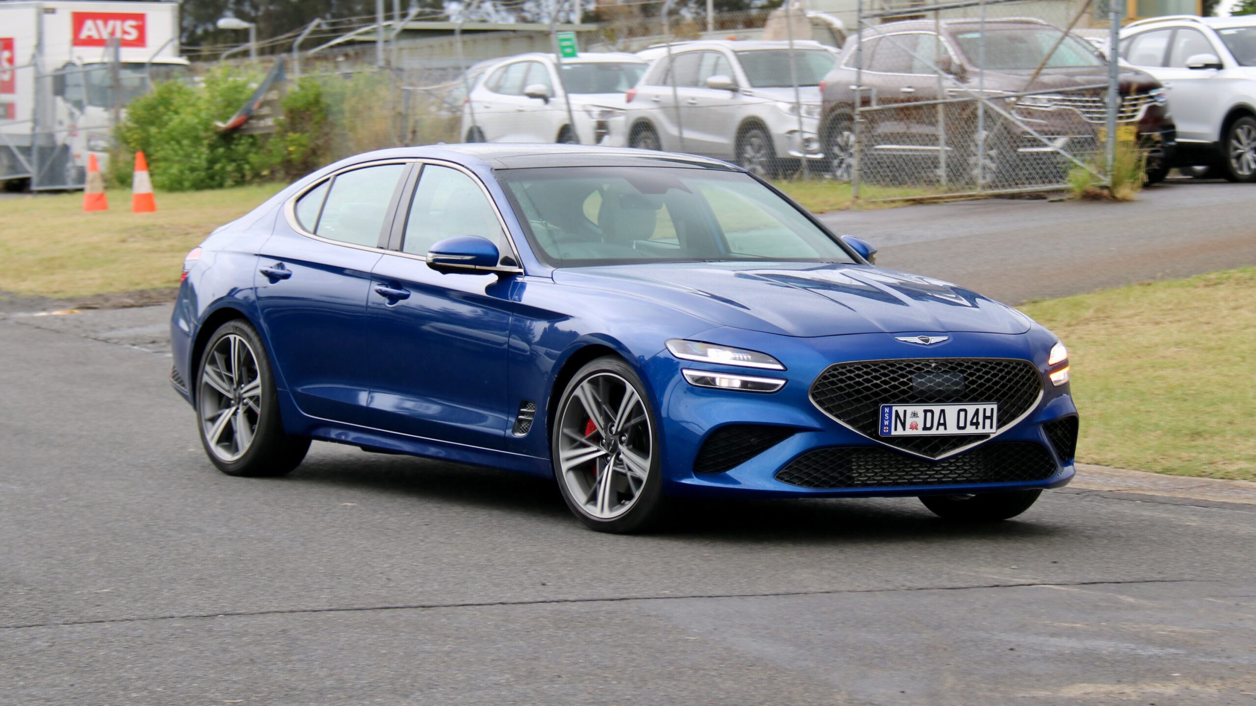 2024 Genesis G70 Sedan front driving